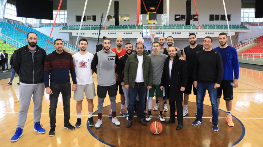 The Palestinian Basketball team with the training crew with Eng. Bara Asfour- the Assistant to the President and Mr. Uday Daraghmeh- the Director of Sports Facilities.